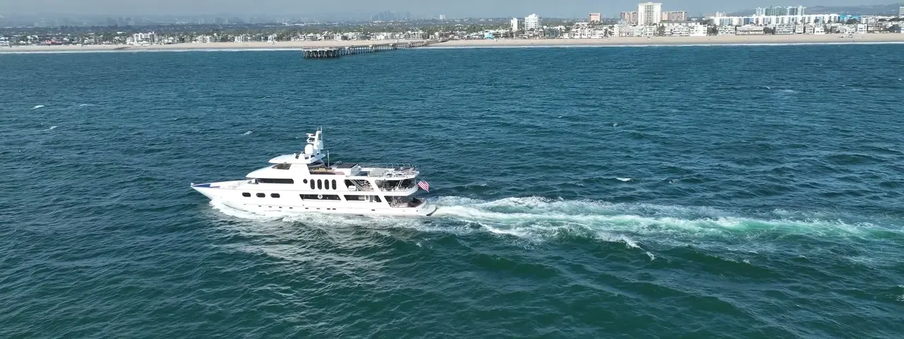 Superyacht underway on open water