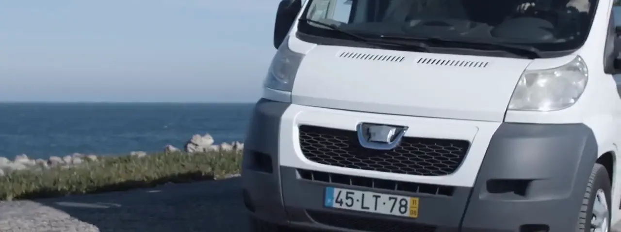 Equipped van on a coastal approach